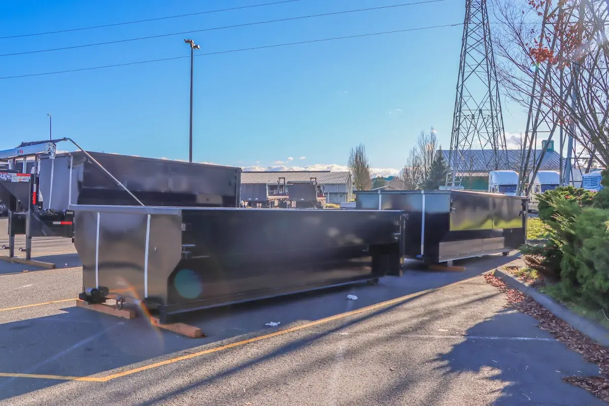 Roll-off dumpster ready for waste disposal at job site for 2 Yard Dumpster Rental in Bowie